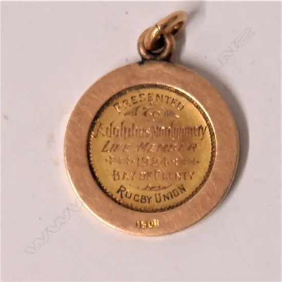 A 15ct. gilded rose gold Bay of Plenty Rugby Union Life Member medallion