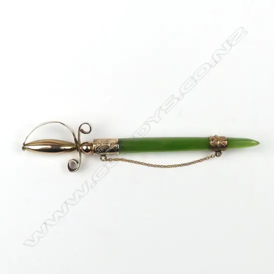 A N.Z. colonial 9ct. yellow gold and greenstone sword bar brooch