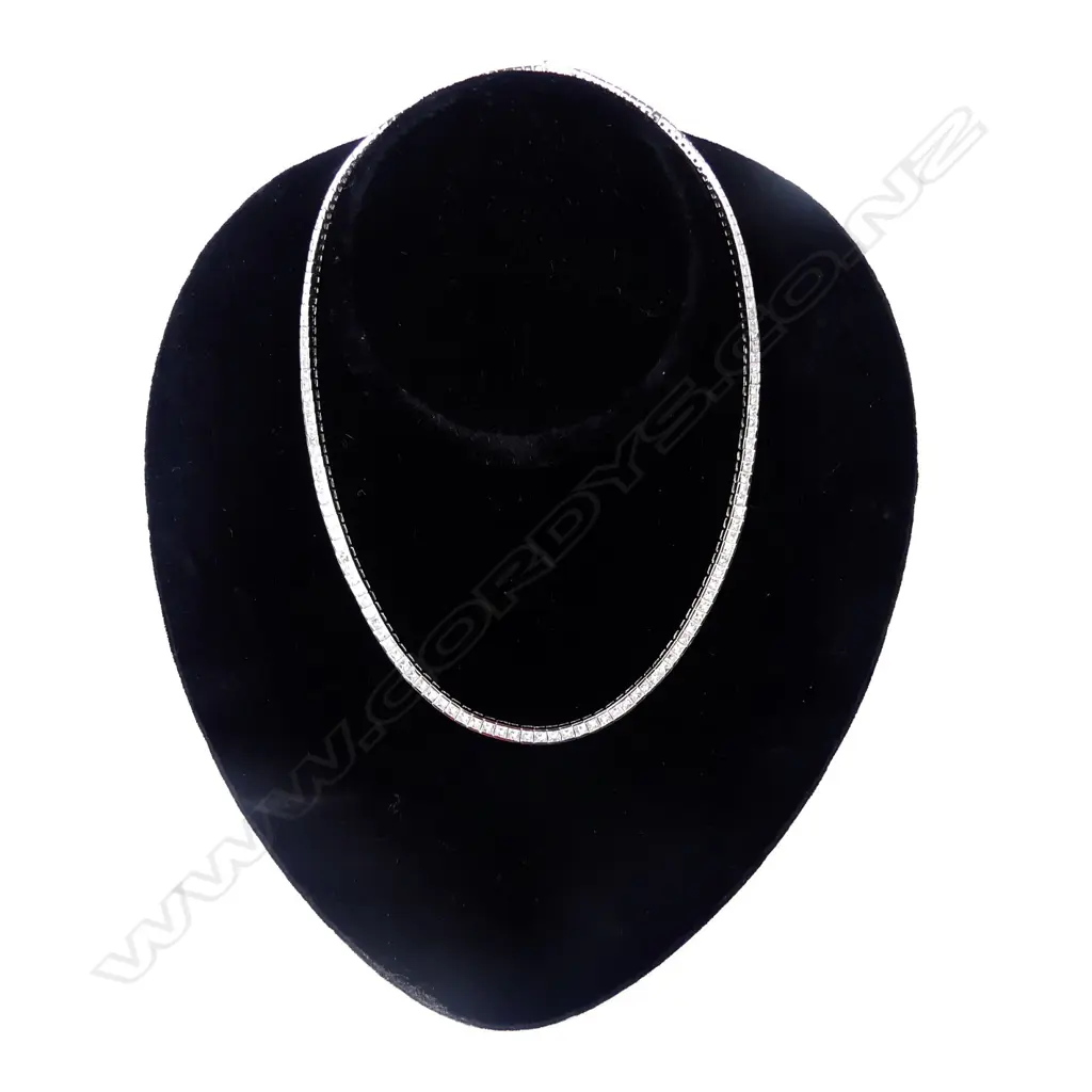 An 18ct white gold and diamond necklace Image 1++