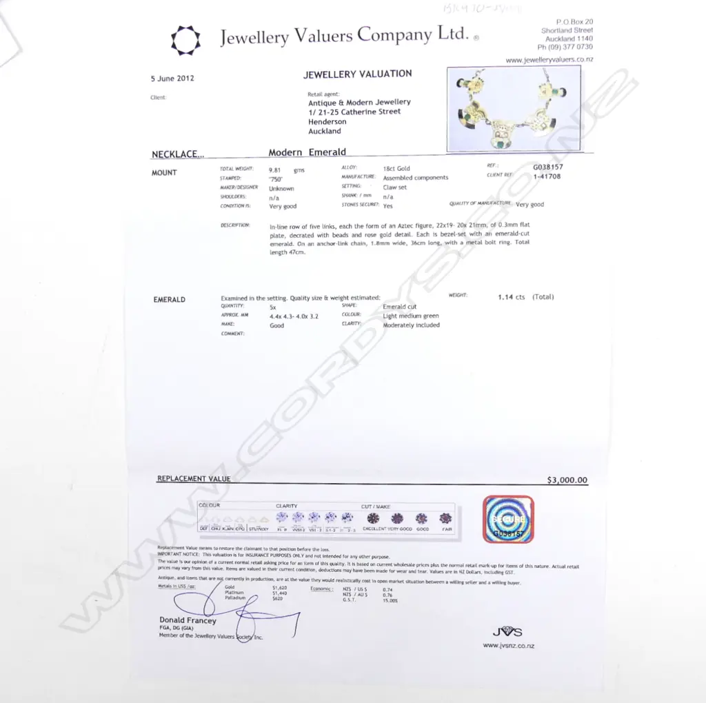 An 18ct gold and emerald necklace Image 1++