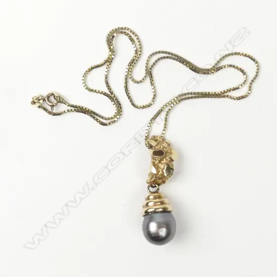 A 9ct gold and black pearl pendant