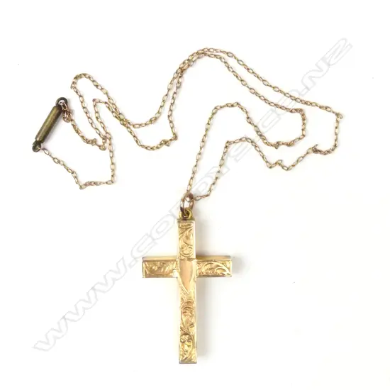 An early 20thC 9ct rose gold engraved cross