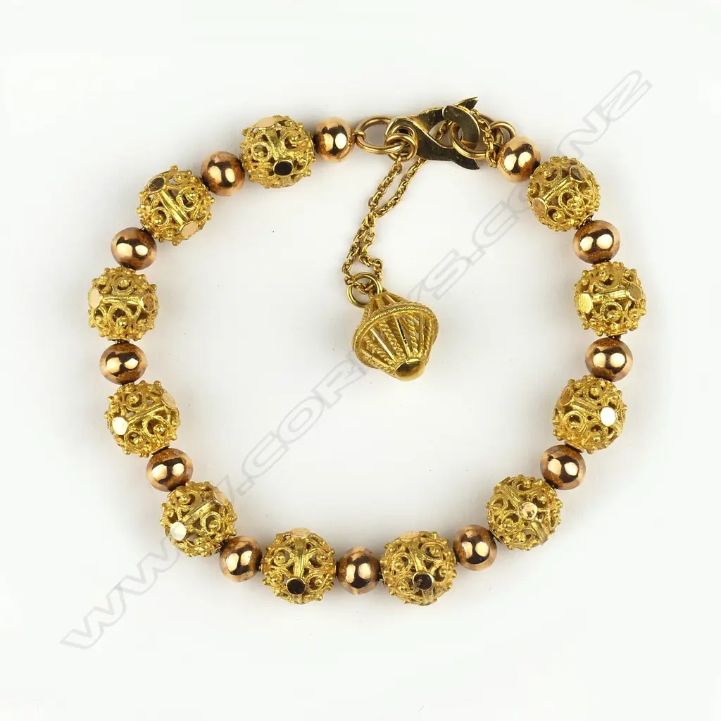 A Cypriot 18ct. yellow and rose gold decorative bead bracelet Image 1++