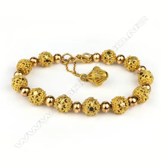 A Cypriot 18ct. yellow and rose gold decorative bead bracelet