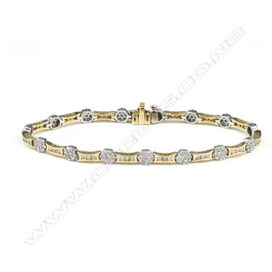 An 18ct yellow & white gold diamond tennis type bracelet