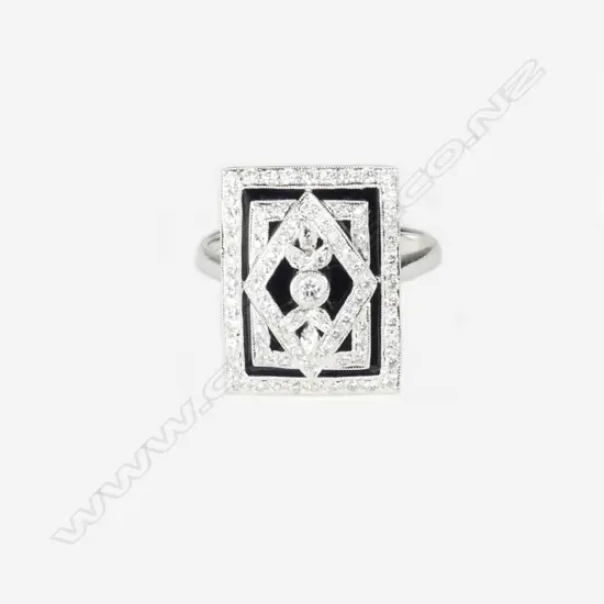 An 18ct white gold and diamond Art Deco style ring