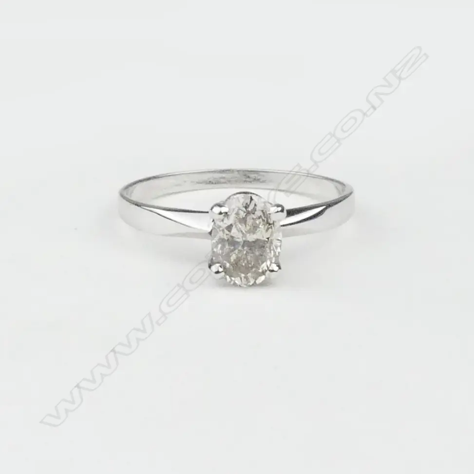 A 14ct white gold and diamond solitaire ring Image 1++