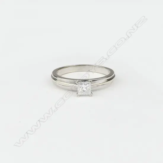 An 18ct white gold and diamond solitaire ring