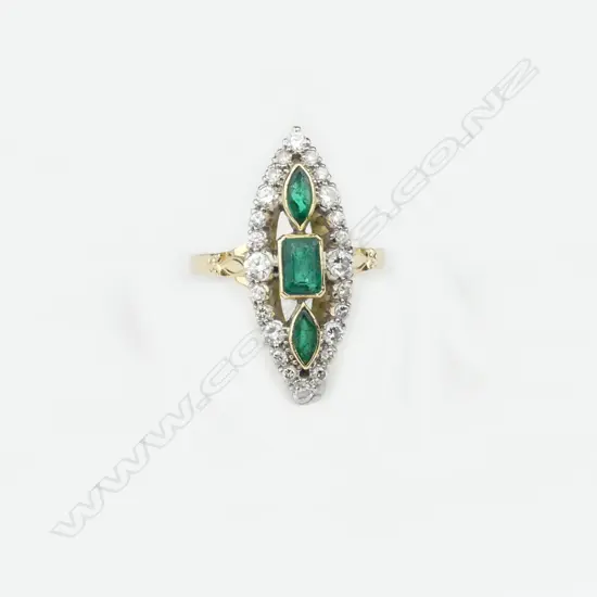 An 18ct gold emerald and diamond antique style ring