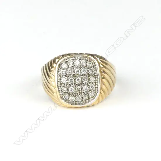 A heavy 9ct yellow gold and multi diamond gents ring