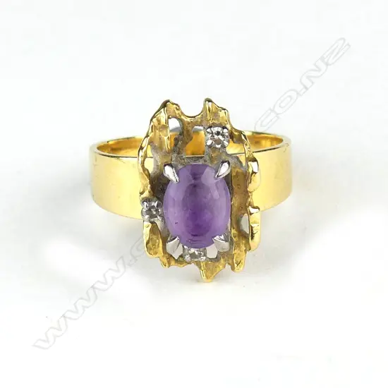 A 1960s designer high carat yellow gold amethyst and diamond ring