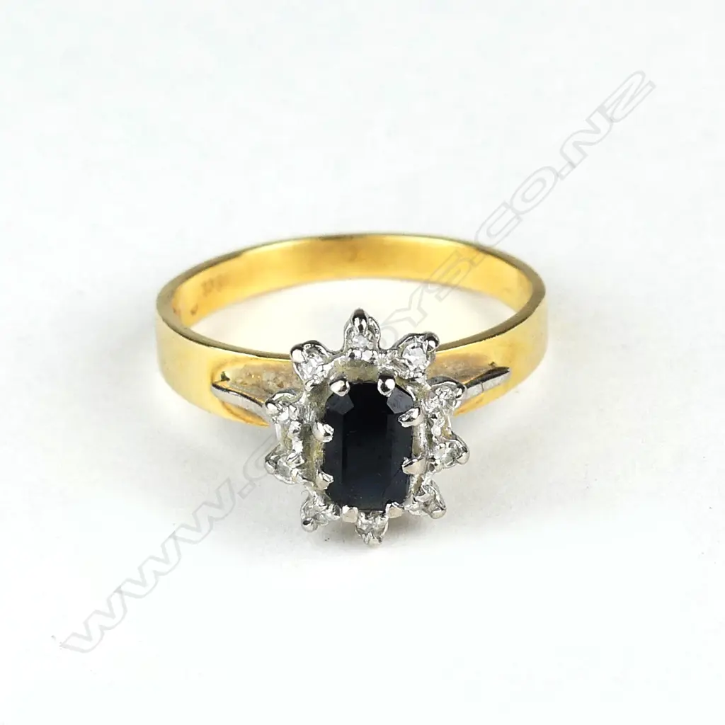 A lady's vintage 18ct. gold sapphire and diamond cluster ring Image 1++