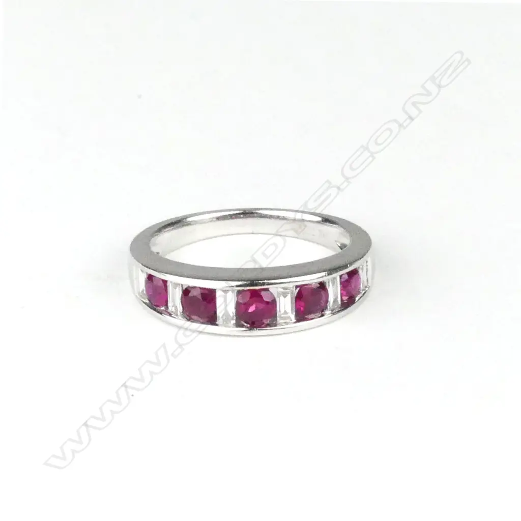 An 18ct white gold diamond and ruby ring Image 1++