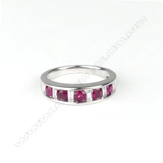 An 18ct white gold diamond and ruby ring