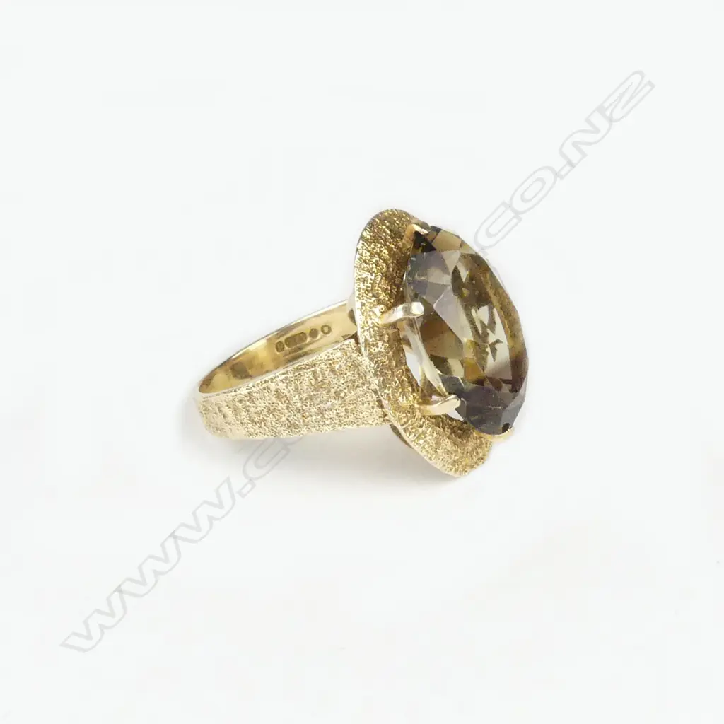 A retro 9ct gold and smoky quartz ring Image 1++