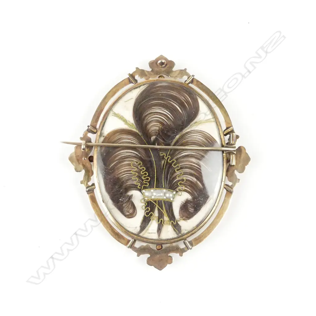 A Victorian 14ct gold mourning brooch Image 1++
