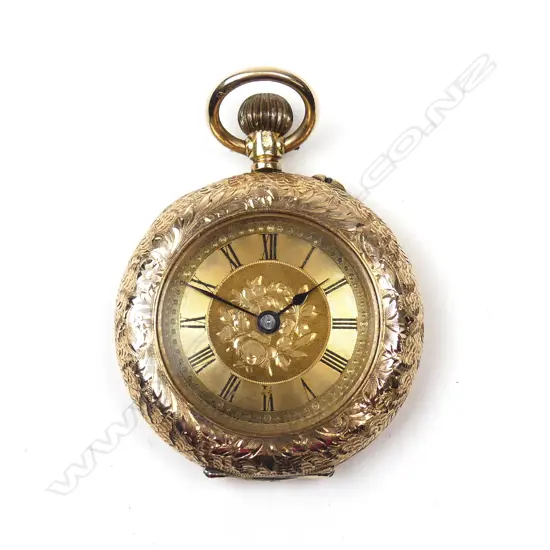 An early 20thC gold engraved lady's open face pocket watch