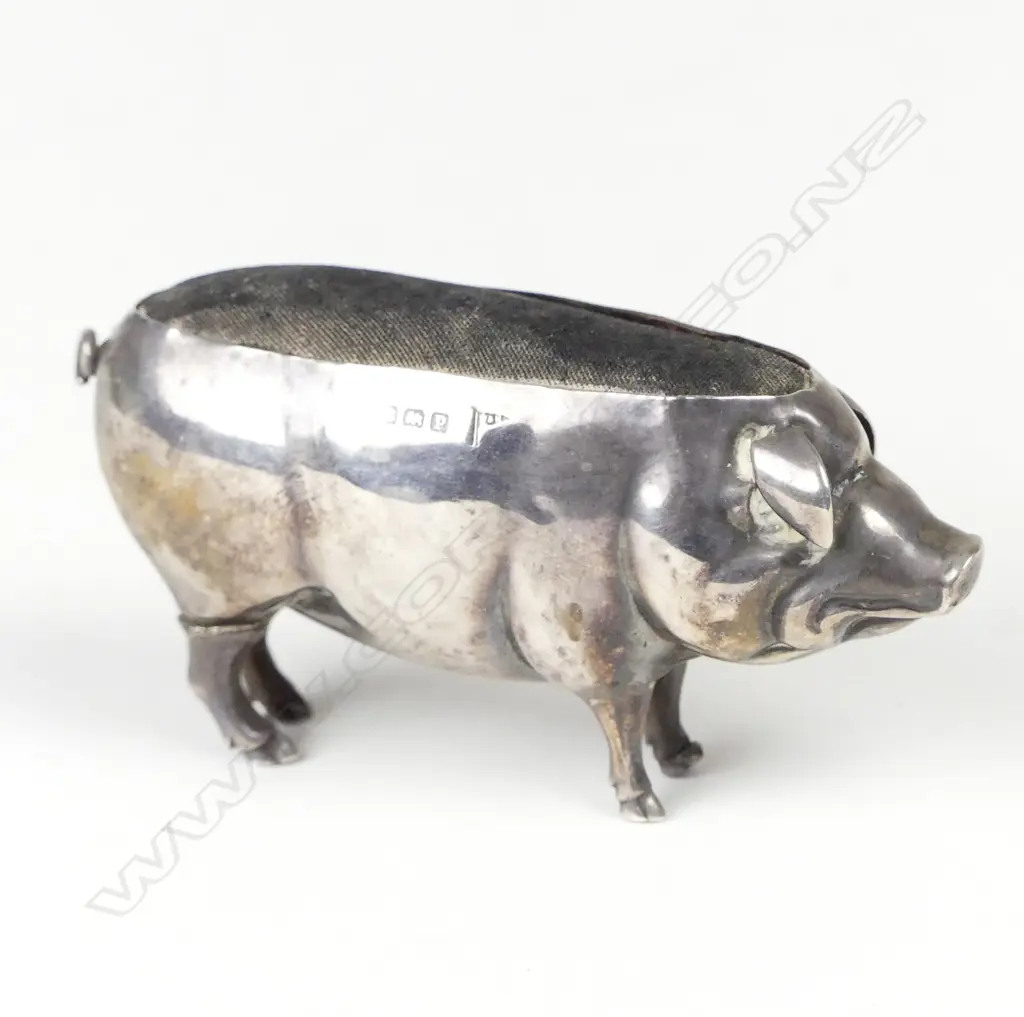 An uncommon Edwardian silver large pig shaped pin cushion Image 1++