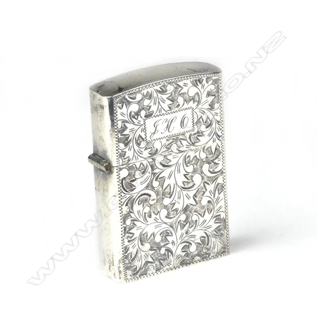 A silver cased Zippo lighter Image 1++