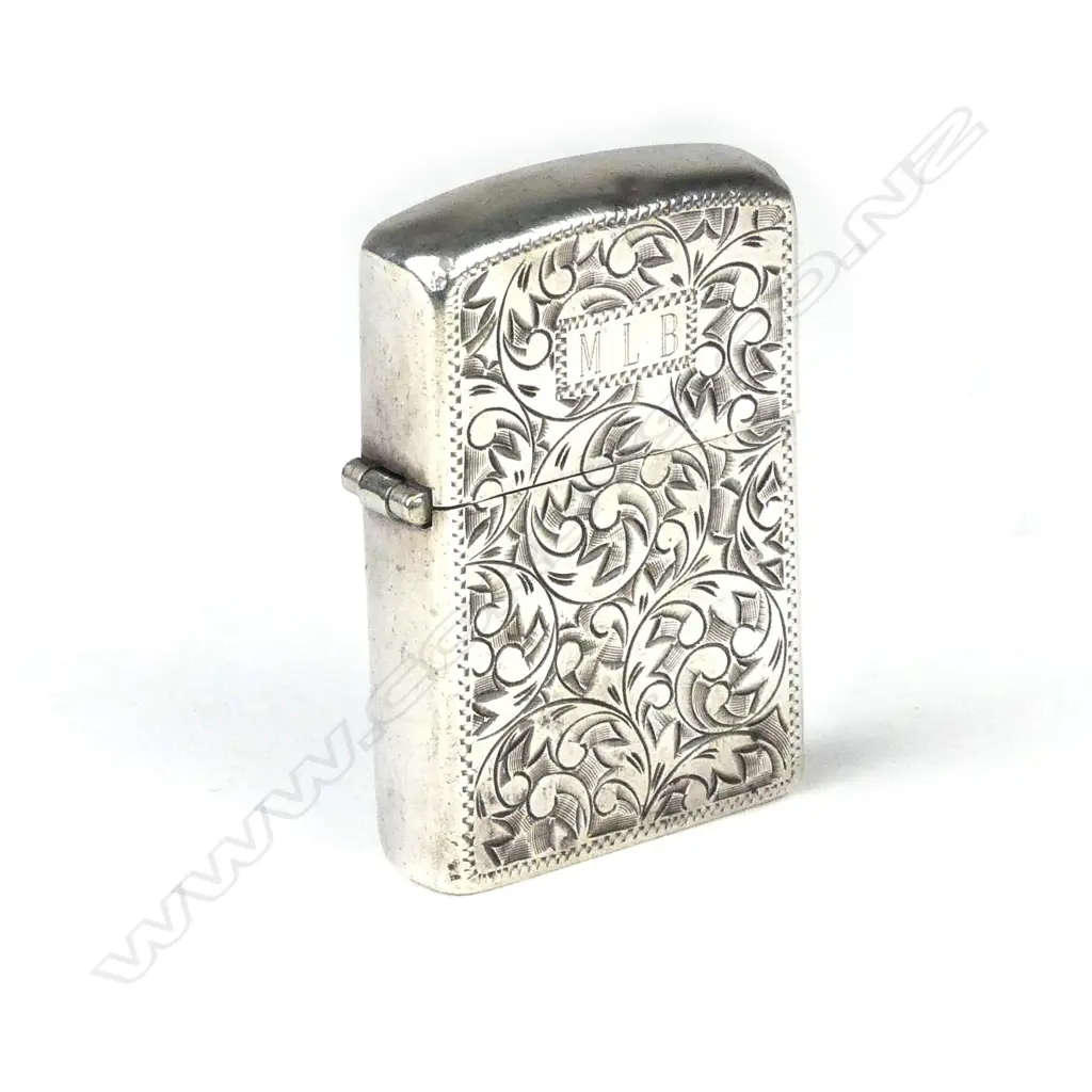 A mid/late 20thC silver cased Zippo lighter Image 1++