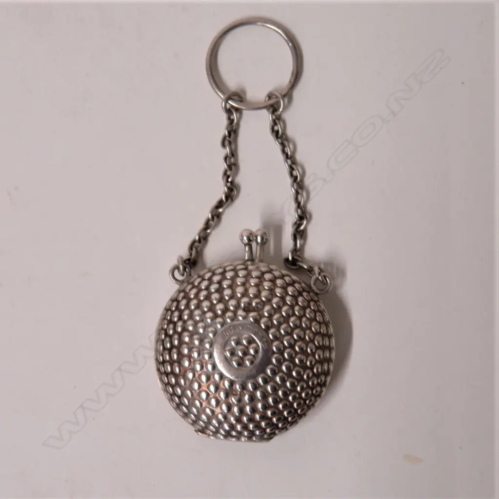 An Edwardian silver lady's finger suspended vanity case Image 1++