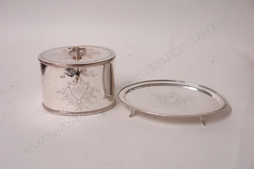 A 19thC silver plate tea caddy and teapot stand Image 1++