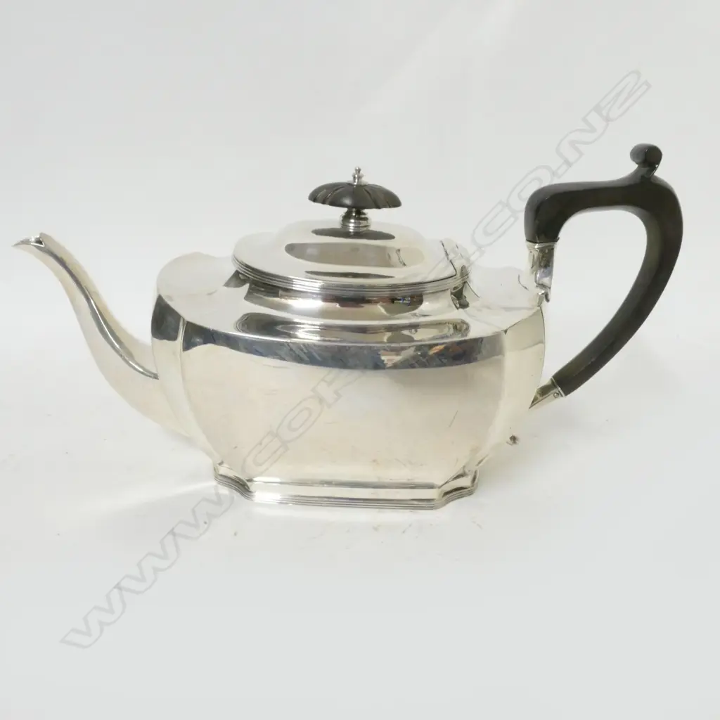A silver tea pot Image 1++