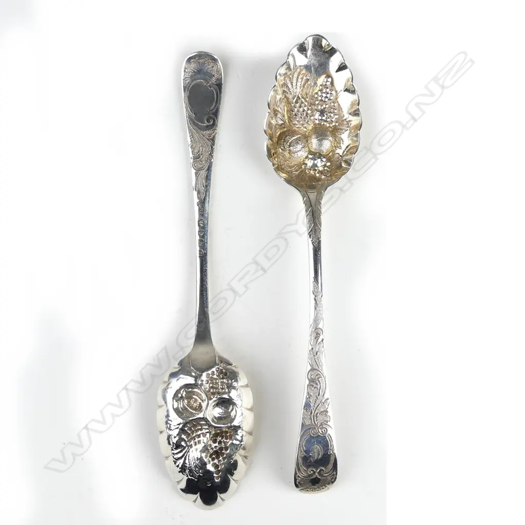 A pair of Georgian silver small berry spoons Image 1++