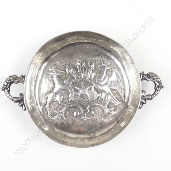 A Mexican Hecho a Mano silver wine tasting cup