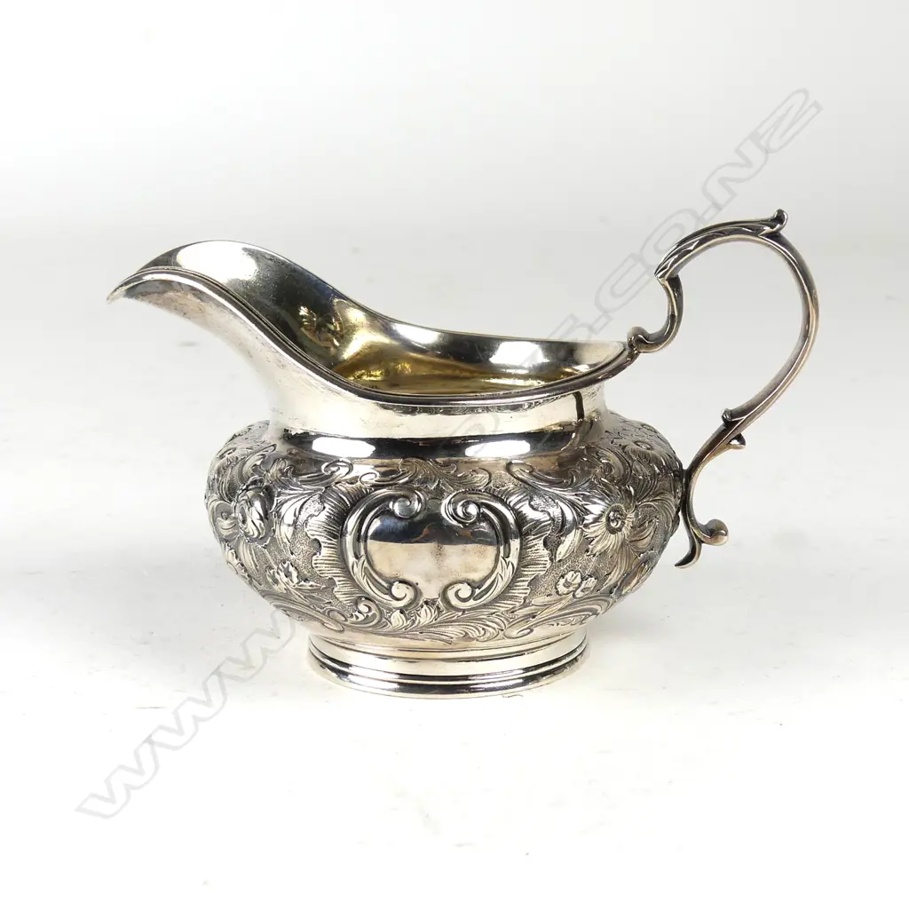 A William IV floral embossed cream jug Image 1++