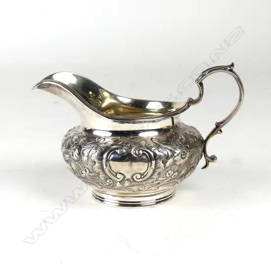 A William IV floral embossed cream jug