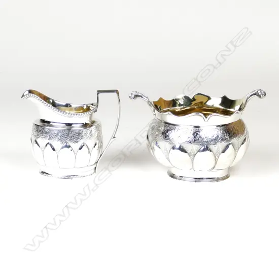 A George III silver sugar and creamer