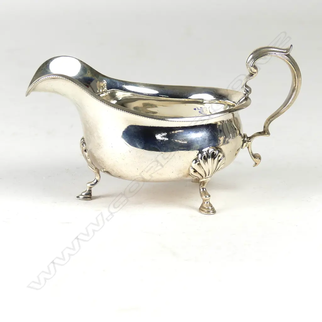 An early 20thC wide bodied silver gravy boat Image 1++