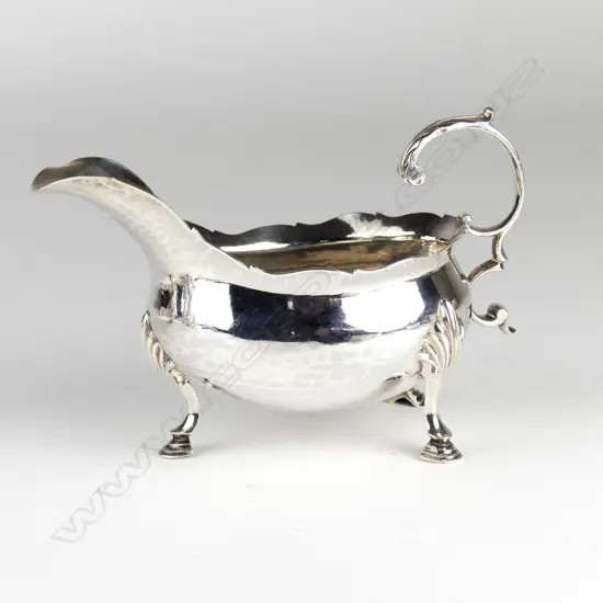 A George III silver fat belly sauce boat