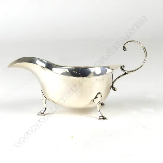 A 1920s silver gravy boat