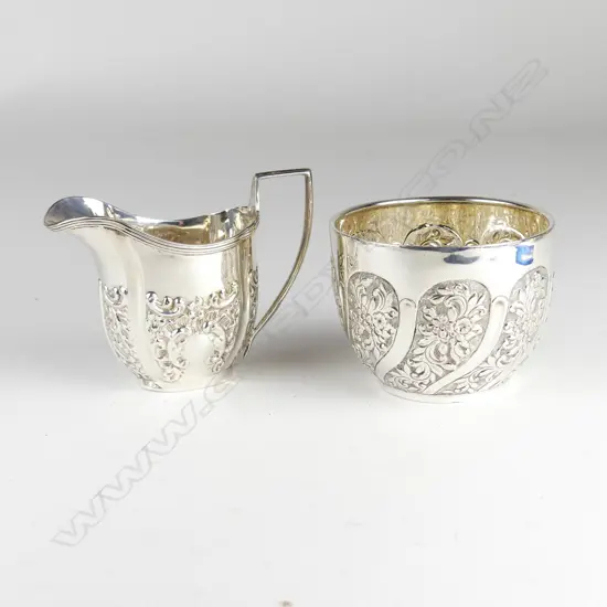 A harlequin silver cream and sugar