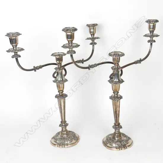 A pair of silver plate candelabra