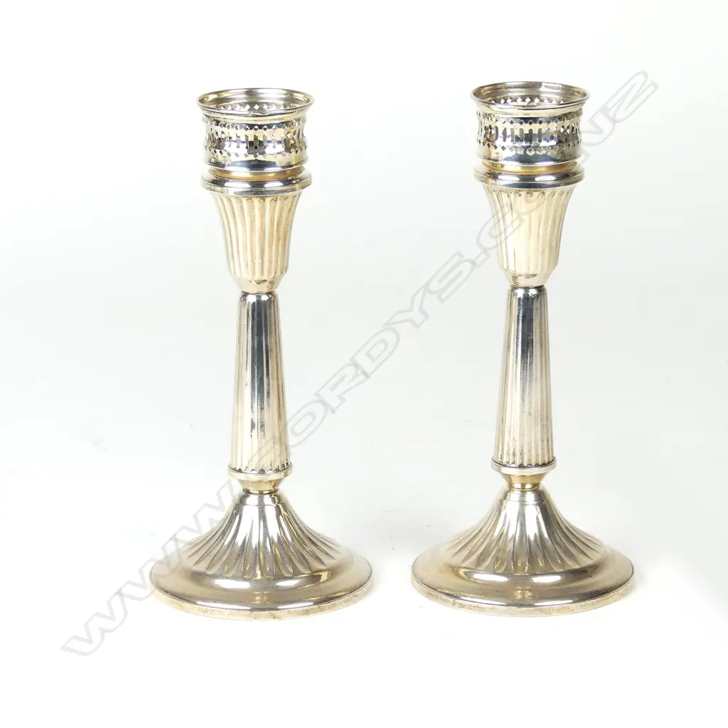 A pair of American Duchin silver column candlesticks Image 1++