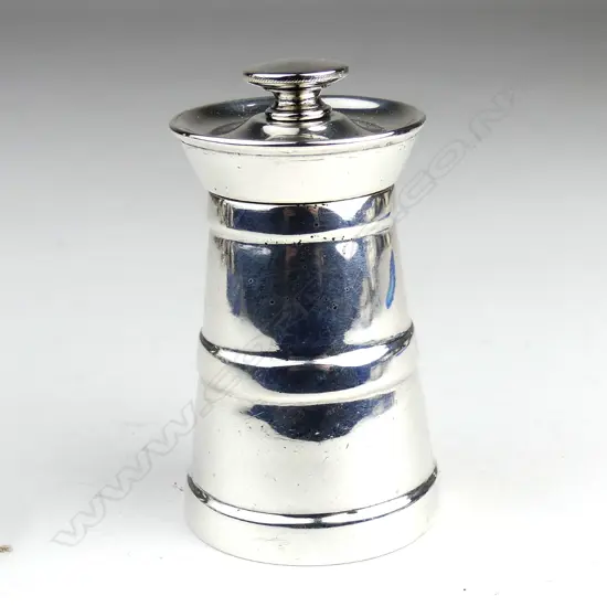 A silver pepper grinder