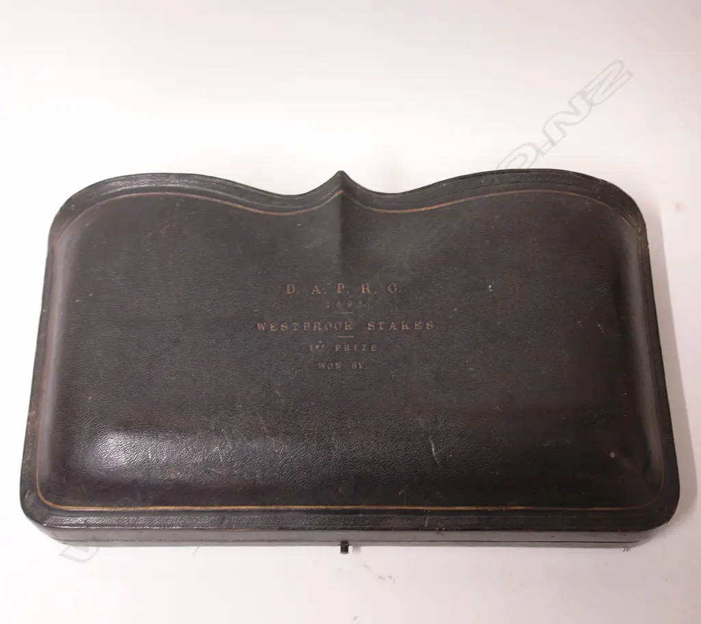 A late Victorian seven-piece cased silver horse-racing club prize condiment set Image 1++