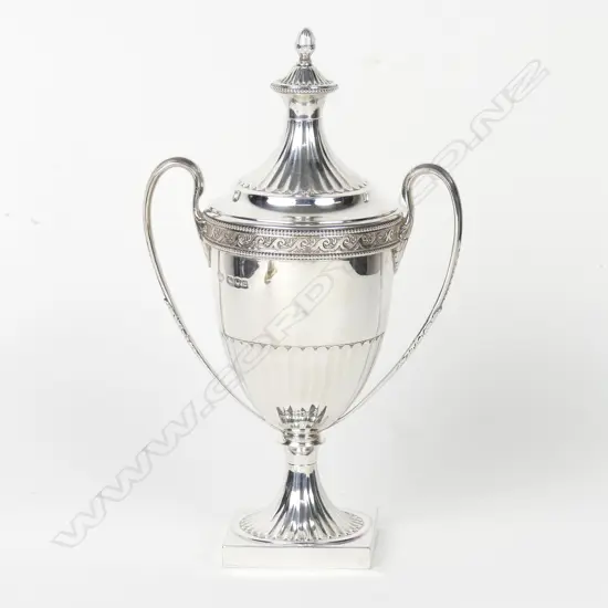 An Adams style two handled urn and cover