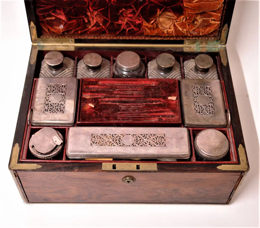 A George IV silver fitted rosewood travelling vanity box Image 1++