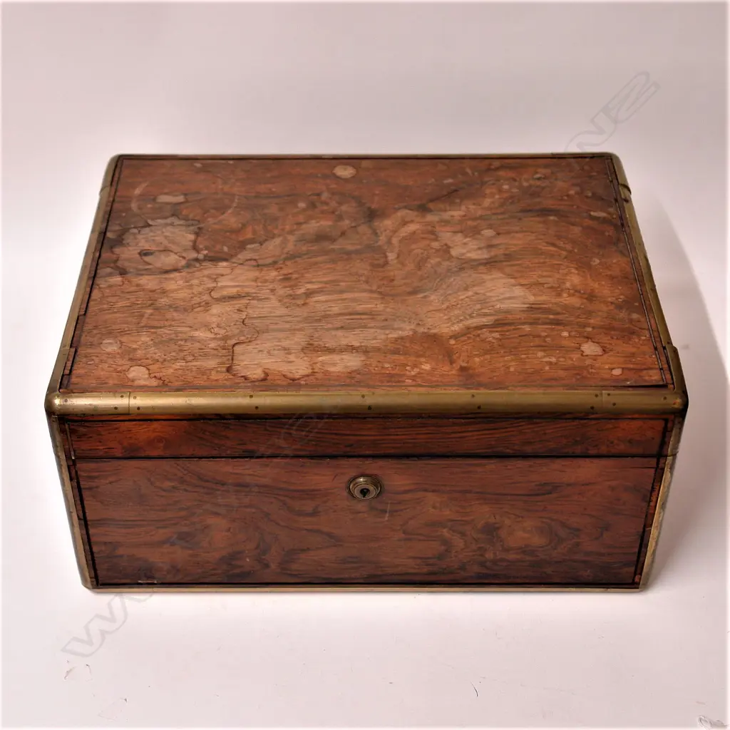A George IV silver fitted rosewood travelling vanity box Image 1++
