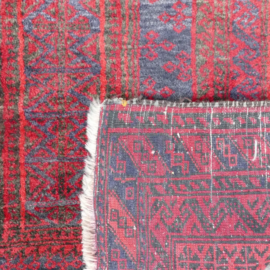 An Afghan Baluch hand knotted rug Image 1++