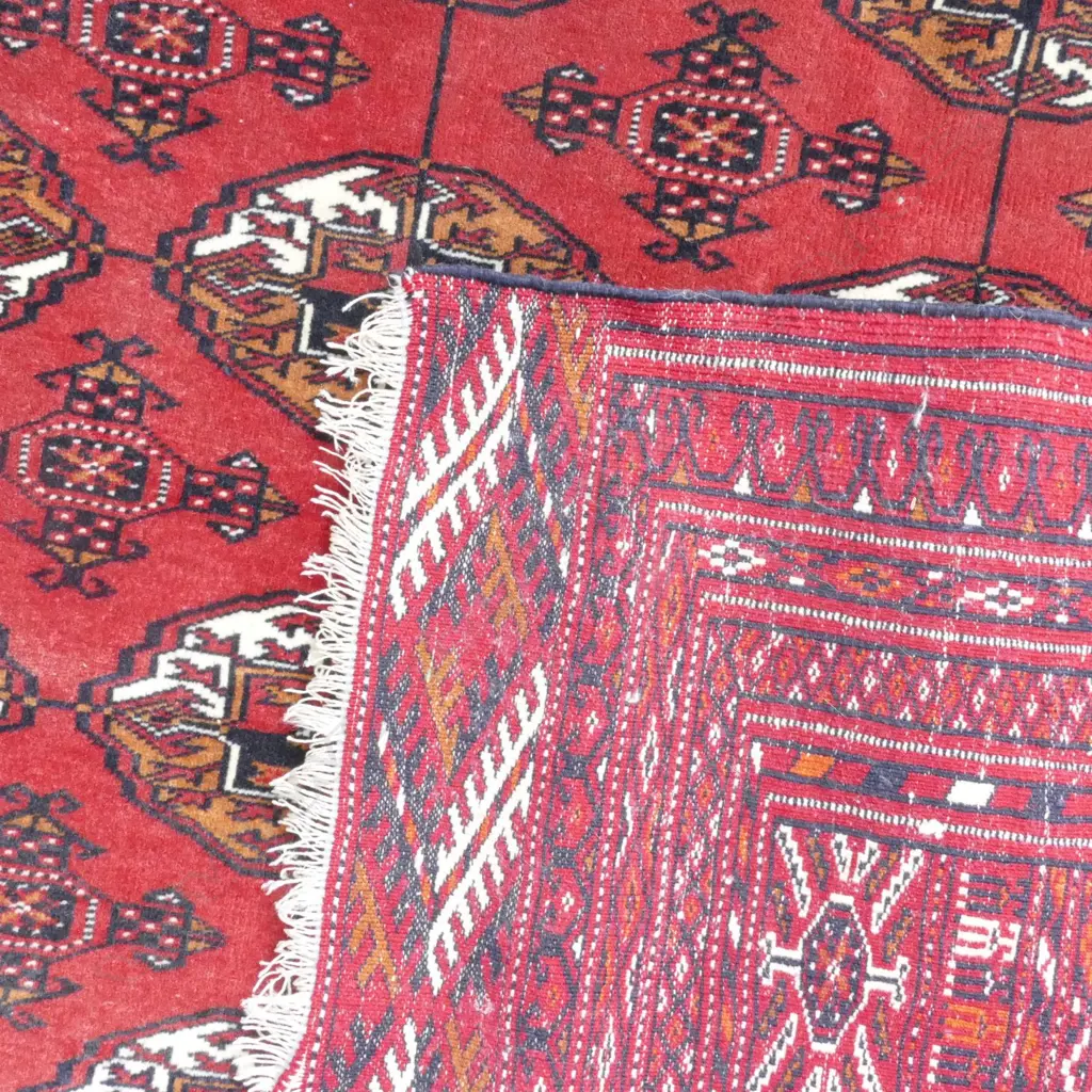 A fine Turkoman hand knotted wool on silk rug Image 1++
