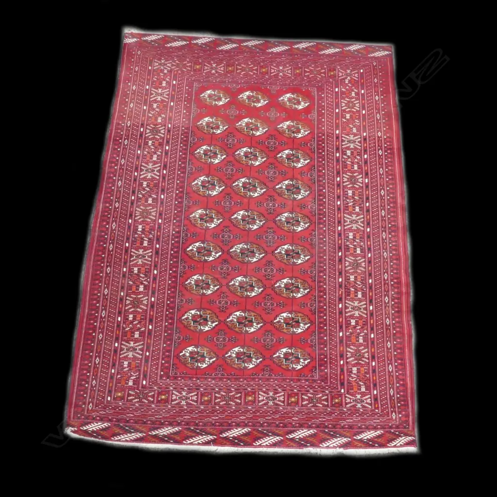 A fine Turkoman hand knotted wool on silk rug Image 1++