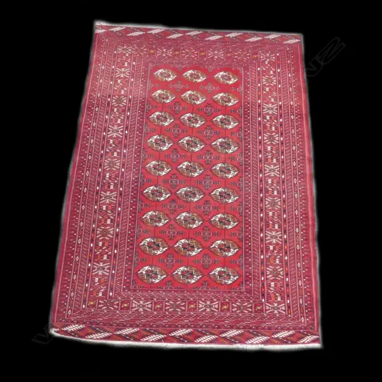 A fine Turkoman hand knotted wool on silk rug