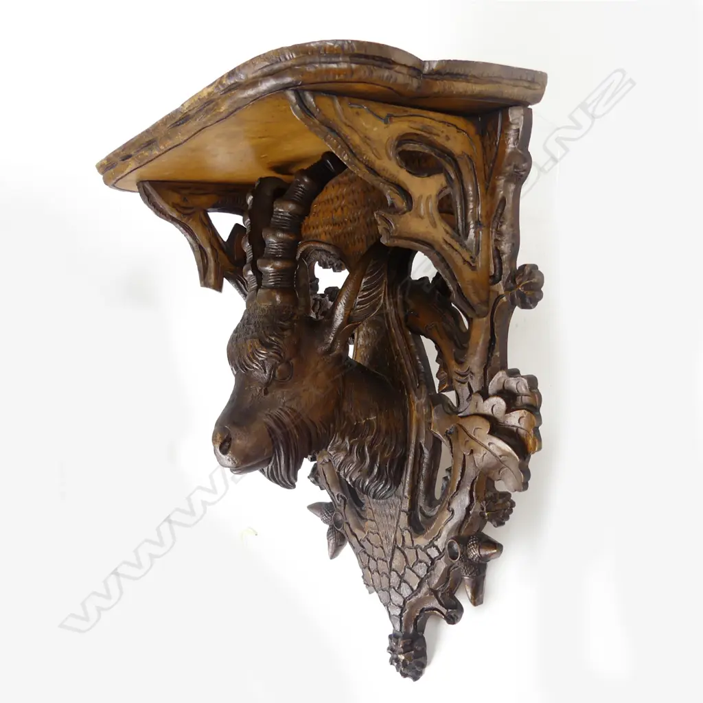 A 19thC Black Forest carved wooden wall sconce Image 1++