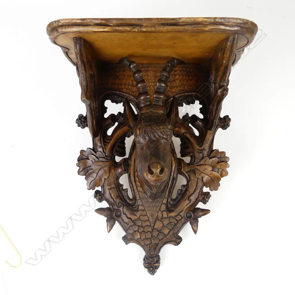 A 19thC Black Forest carved wooden wall sconce Image 1++