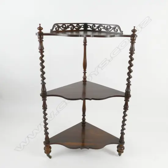 An early 19thC rosewood three tier corner whatnot